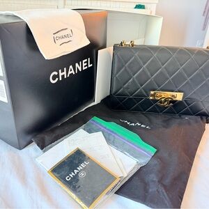 CHANEL Black Quilted Leather Shoulder Bag with Gold Hardware